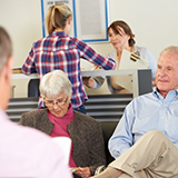 Clinic patients in a waiting room